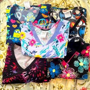 Lot of 5 cute scrub tops xs and xxs. Lightly worn great condition